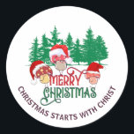 Sticker Rond Joli MERRY CHRISTMAS MUSHROOM Christian<br><div class="desc">Joli CHRISTMAS MUSHROOM Christian Holiday Stickers avec TEXTE PERSONNALISABLE. Idéal pour la famille, les amis, les collègues et les clients. Ce modèle saisonnier de cottagecore montre trois toadstools portant des chapeaux de Père Noël avec des glades de forêt bois dans l'arrière - plan. Le texte MERRY CHRISTMAS apparaît dans la...</div>