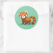 Sticker Rond Joli panda roux sur fond vert (Sac)