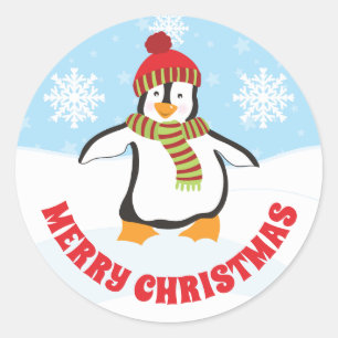 Sticker Rond Joli pingouin de Noël avec chapeau rouge et vert