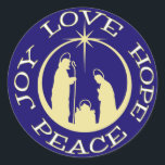 Sticker Rond Joy Love Hope Peace Christmas<br><div class="desc">Gardez le Christ dans votre correspondance de Noël et vos activités avec ce bel autocollant "Joy Love Hope Peace". Le texte tourne autour d'une scène de la nativité de silhouette dorée avec l'Étoile de Bethléem en haut. Tout est placé sur un arrière - plan bleu foncé pour le faire vraiment...</div>