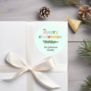 Sticker Rond Joyeux Noël! Coloré, typographie, chapeau santa