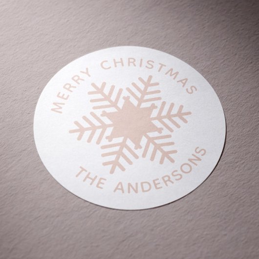 Sticker Rond Joyeux Noël. Fêtes aux flocons de neige rose
