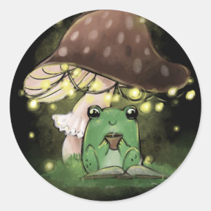 Sticker Rond Juste une petite grenouille lisant un livre