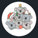 Sticker Rond Koala Christmas Tree Funny Animal Christmas<br><div class="desc">The koalas look like a christmas tree. Veuh fairy lights and Santa's hats they are perfect pour Christmas. Every koala lover is happy about cute animals for the winter holidays.</div>