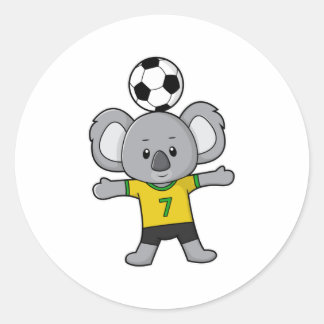 Sticker Rond Koala comme joueur de football avec balle de footb