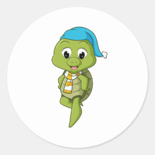 Sticker Rond la tortue avec le casquette et l'écharpe est prête