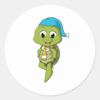 Sticker Rond la tortue avec le casquette et l'écharpe est prête