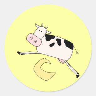 Sticker Rond La vache saute par-dessus des T-shirts et des