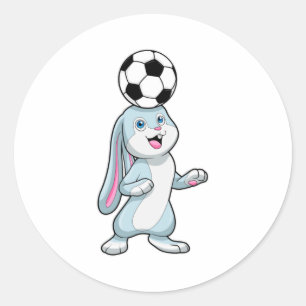 Sticker Rond Lapin comme joueur de football avec balle de footb