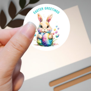 Sticker Rond Lapin de voeux de Pâques et ses oeufs peints