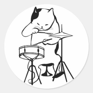 Sticker Rond Le chat de batteur bat du tambour de mignon drôle