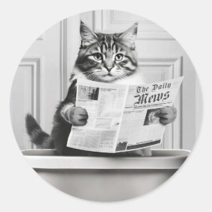 Sticker Rond Le chat est assis sur les toilettes, le chat lit u