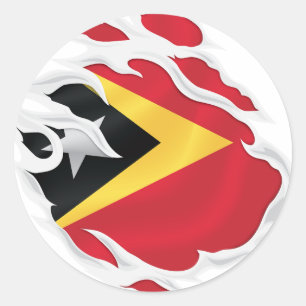 Sticker Rond Le drapeau déchiré du Timor oriental