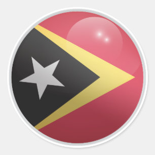 Sticker Rond Le drapeau du cercle glacé du Timor oriental