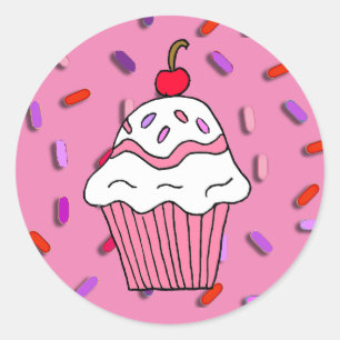 Sticker Rond Le petit gâteau rose avec la sucrerie arrose