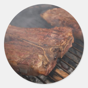 Sticker Rond Les biftecks grillant le barbecue grille la viande