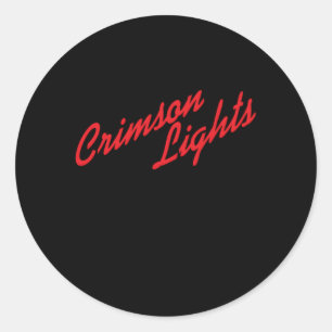 Sticker Rond Les Lumières Des Crimson Jeunes Et Intrépides