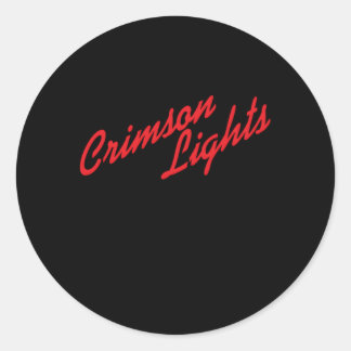 Sticker Rond Les Lumières Des Crimson Jeunes Et Intrépides