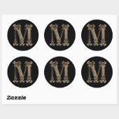 Sticker Rond Lettre M dorée initiale ou monogramme sur fond noi (Feuille)