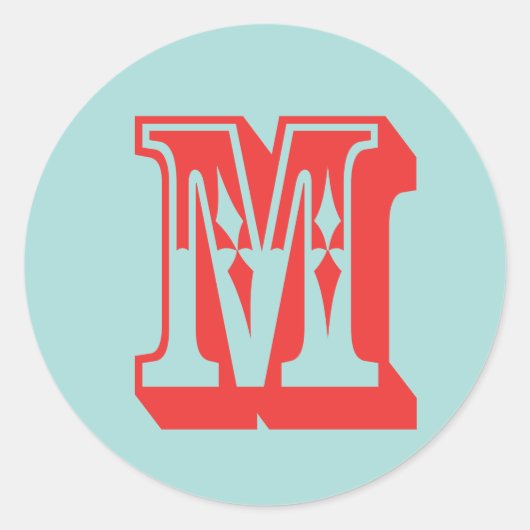 Sticker Rond Lettre M style carnaval monogramme première préfér (Devant)