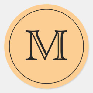 Sticker Rond LETTRE MONOGRAPHIQUE NOIRE ORANGE Soleil Personnal