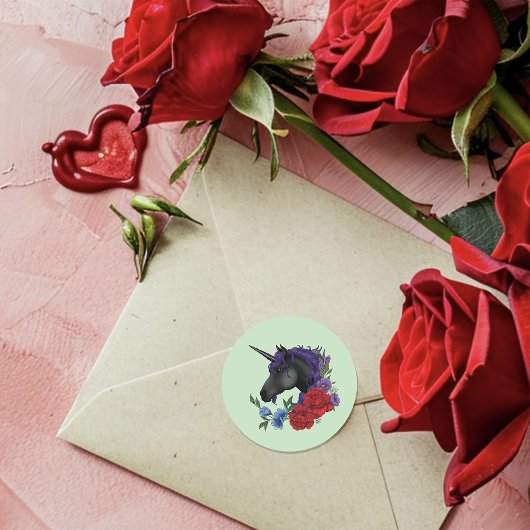 Sticker Rond Licorne noire fleurs rouges violettes