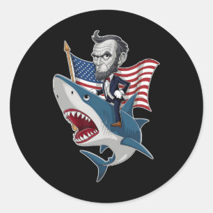 Sticker Rond Lincoln Riding A Shark 4 juillet Patriotic Graph