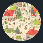 Sticker Rond Little Christmas Village<br><div class="desc">Design rétro avec rouge et vert citron. Village de Noël avec arbres de Noël décorés,  maisons décorées,  gens se promenant et voitures dans les allées. Cute</div>