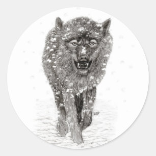Sticker Rond Loup noir en colère dans la neige, hiver sauvage