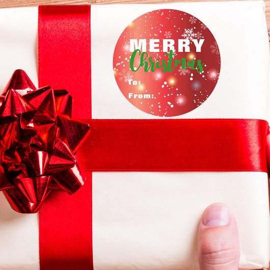 Sticker Rond Lumières de fête rouges Bokeh flocon de neige Joye