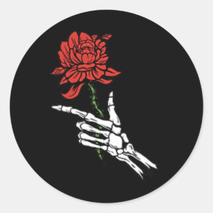 Sticker Rond Main de squelette tenant une rose rouge