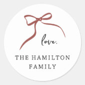 Sticker Rond Main Whimsical Bow tiré ruban rouge "Amour" (Devant)