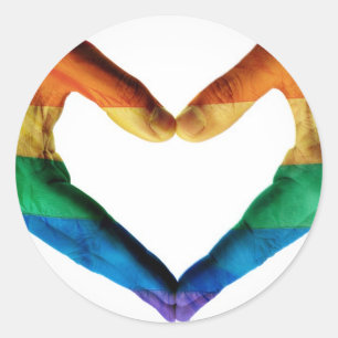 Sticker Rond Mains peintes comme un coeur arc-en-ciel