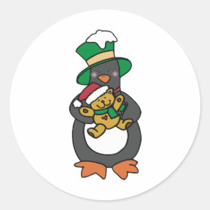 Sticker Rond Manchot irlandais tenant un ours en peluche de Noë
