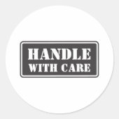 Sticker Rond Manipulation avec soin (Devant)