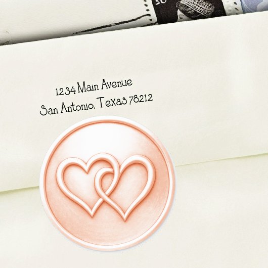 Sticker Rond Mariage aux deux cœurs entrelacés de pêche