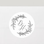 Sticker Rond Mariage de germes floraux Monogramme initial<br><div class="desc">Autocollants monogrammes mariages personnalisés avec calligraphie moderne et design de couronnes florales dessinées à la main. Parfait pour ajouter une touche de style aux enveloppes mariages,  aux emballages cadeaux,  etc.</div>