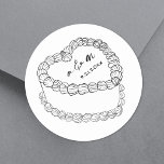 Sticker Rond Mariage Whimsical Gâteau Vintage tiré à la main<br><div class="desc">Stickers Monogramme Mariage de gâteaux Vintages personnalisés. Ces autocollants de mariage ronds personnalisés présentent au centre une simple illustration de gâteau de style vintage, surmontée des initiales monogrammes du couple et de la date du mariage pour une touche intemporelle et élégante. Le design minimaliste utilise un mélange de polices serif...</div>