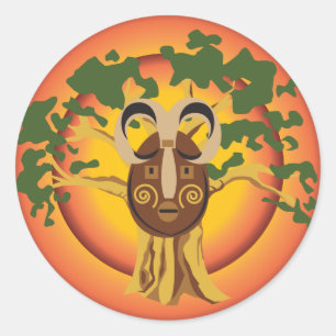 Sticker Rond Masque tribal primitif sur l'arbre Sun rougeoyant