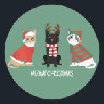 Sticker Rond Meowy Christmas Cats<br><div class="desc">Illustration de nombreux chats différents. Ils sont habillés en tenue de vacances. Ces têtes de chat sont utilisées pour créer la forme d'un arbre de Noël pour la saison des Fêtes.</div>