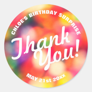 Sticker Rond Merci! Anniversaire avec des arroses floues
