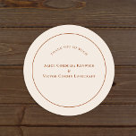Sticker Rond Merci Mariage en ivoire Boho Arch simple<br><div class="desc">Ce Sticker Mariage Boho Arch Simple Merci Classic Round Sticker est doté d'une palette sophistiquée et muette d'ivoire neutre, associée à de magnifiques combinaisons de mélange et d'options de rouille en terre cuite, vert sauge et prune. L'élégance sobre de la typographie simple et des arches douces crée une esthétique apaisante...</div>