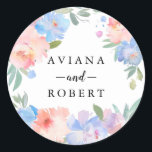 Sticker Rond Moderne Pastel Blue Rose Wreath Wedding Favor<br><div class="desc">Les fleurs d'aquarelle bleu pastel et rose créent une couronne florale lâche moderne et tendance. Les noms des couples mariages sont écrits au centre. Ce sceau de faveur de mariage fait partie de la collection Joyeux. Il contient de nombreux modèles do-it-yourself que vous pouvez utiliser pour personnaliser la papeterie mariage...</div>