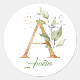 Sticker Rond Moderne tendance Un monogramme vert et doré feuill