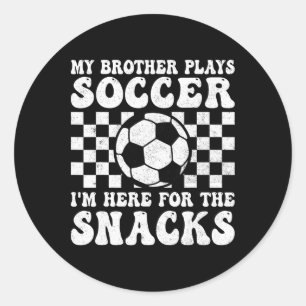 Sticker Rond Mon frère joue au football, je suis là pour les sn