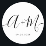 Sticker Rond Monogramme minimaliste Script Date de mariage pers<br><div class="desc">Élevez les détails de votre mariage avec l'autocollant de date de mariage personnalisé Monogramme minimaliste. Cet autocollant élégant et personnalisé ajoute une touche de sophistication à votre papeterie mariage, vous permettant de présenter votre monogramme et votre date mariage d'une manière simple mais impactée. L'autocollant présente une conception minimaliste de script...</div>