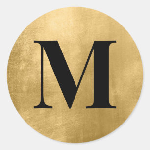 Sticker Rond Monogramme noir sur papier d'aluminium doré faux