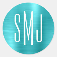 Monogramme trois lettres en feuille de bleu turquo
