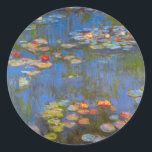 Sticker Rond Nénuphars par Claude Monet, Vintage Nature Art<br><div class="desc">Nénuphars by Claude Monet est une vintage impressionnisme de beaux-arts peinture nature avec des fleurs nénuphars dans un étang dans le jardin de Monet chez lui à Giverny, France. De belles fleurs flottent dans l'eau et le reflet de saules pleurants verts. Claude Monet aimait peindre "en plein air" ou "en...</div>