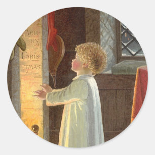 Sticker Rond Noël vintage, enfant se réchauffant près de la che